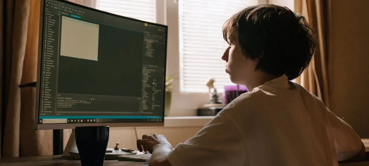 A curious kid learning programming